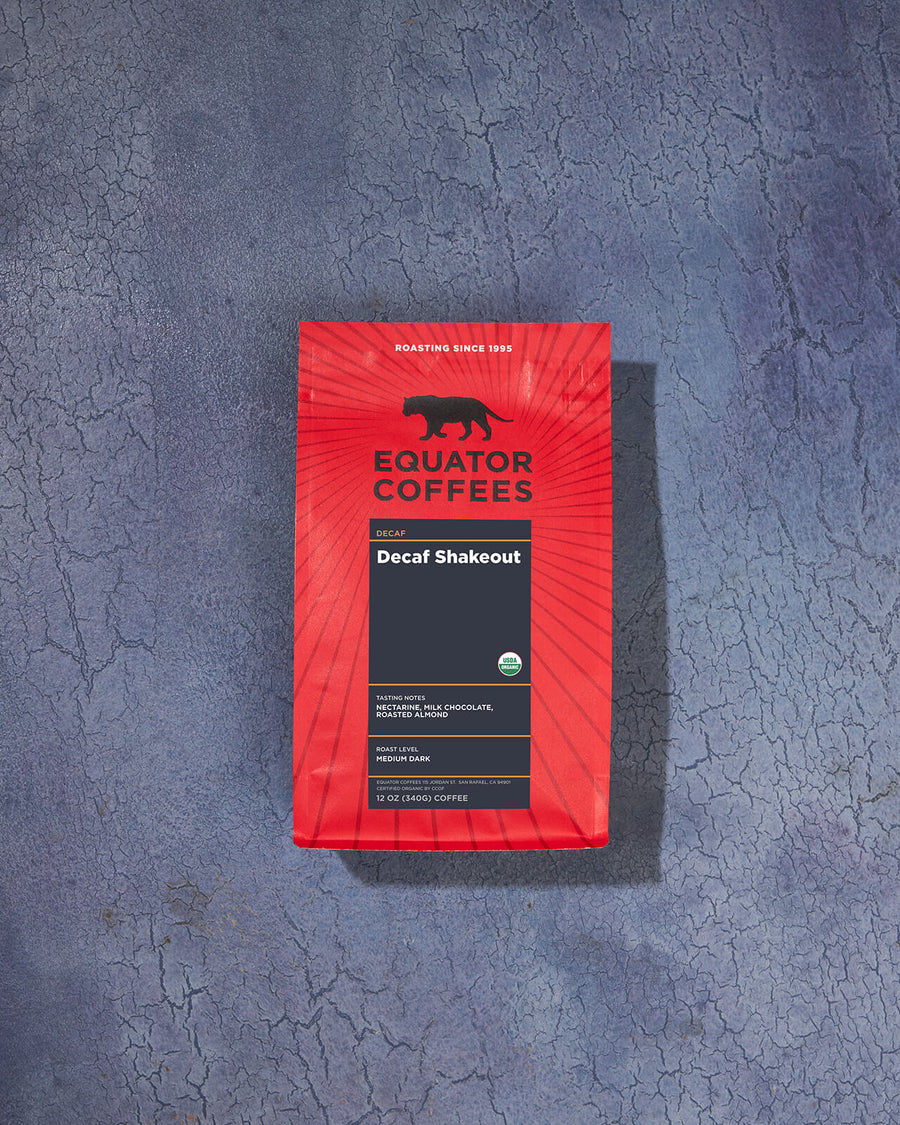 Decaf Shakeout Organic Blend | Certified Organic Decaf Coffee | Coffee Bag Backdrop | Equator Coffees